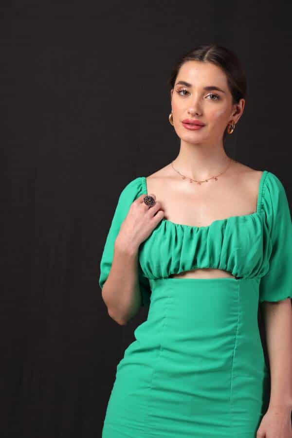 A fashionable woman wearing a trendy mini dress, perfect for casual or party wear.