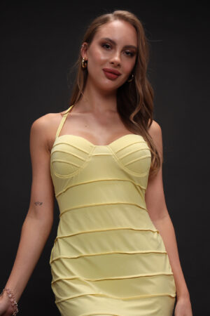 A sleek ombre bodycon dress blending vibrant shades, perfect for stylish events