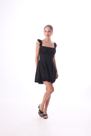 Black short dress by Tints with a sleek and elegant design, perfect for any occasion