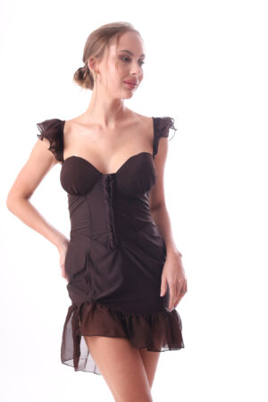 A fashionable woman wearing the Myla Brown mini dress, featuring a classic design and a rich brown hue, ideal for day or night events.